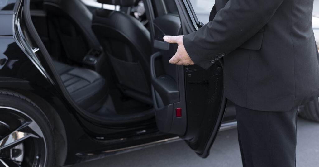 driver with opened car door ezgif.com resize