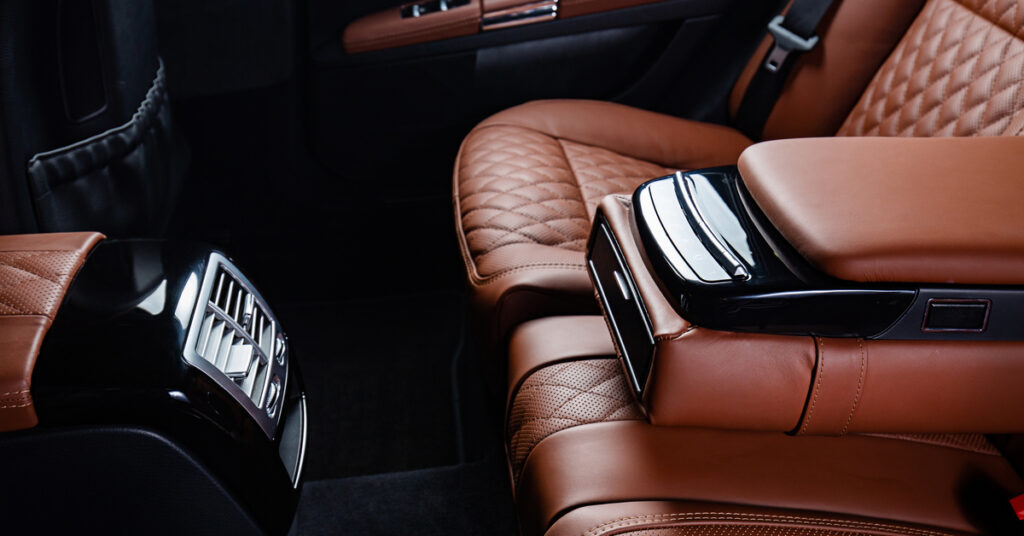 Discovering the Best Kept Secret: Luxury Car & Limo Services 1 luxury car interior brown black colors ezgif.com resize