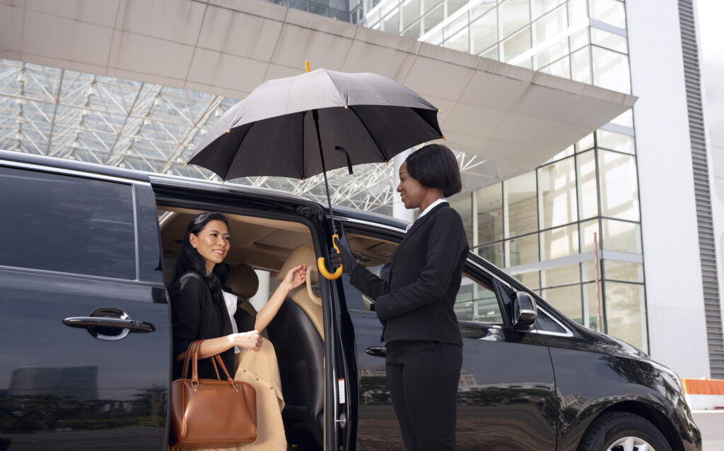 businesswoman getting taxi cab